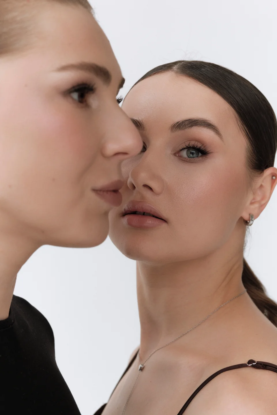 Close-up beauty portrait of two models